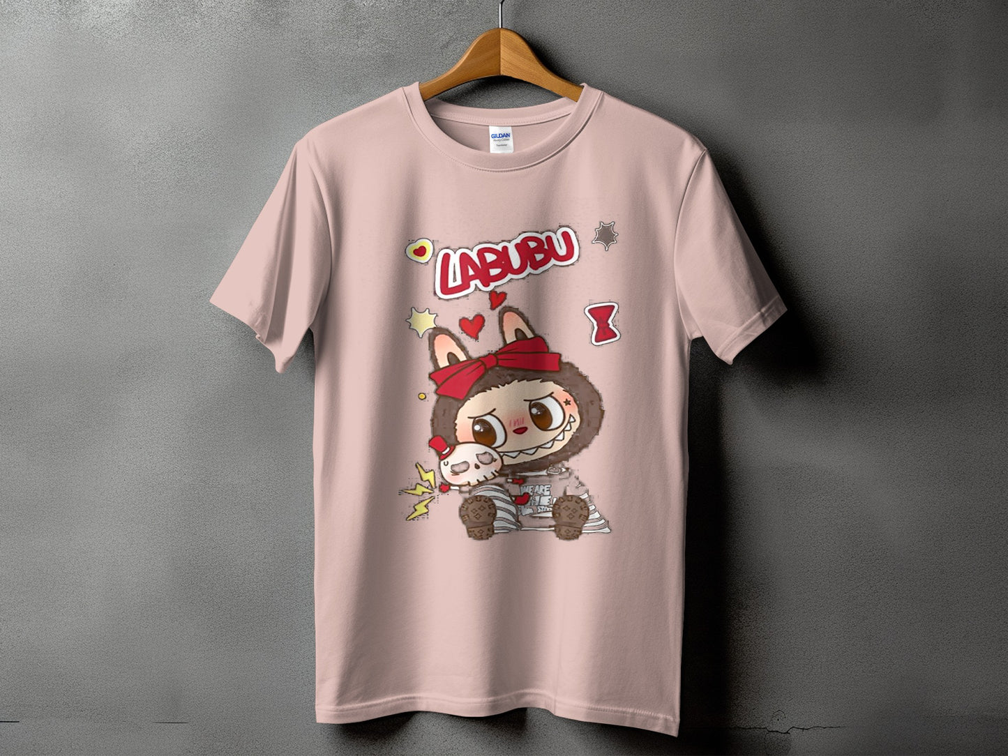 Pink t-shirt with Labubu character illustration and the text "LABUBU".