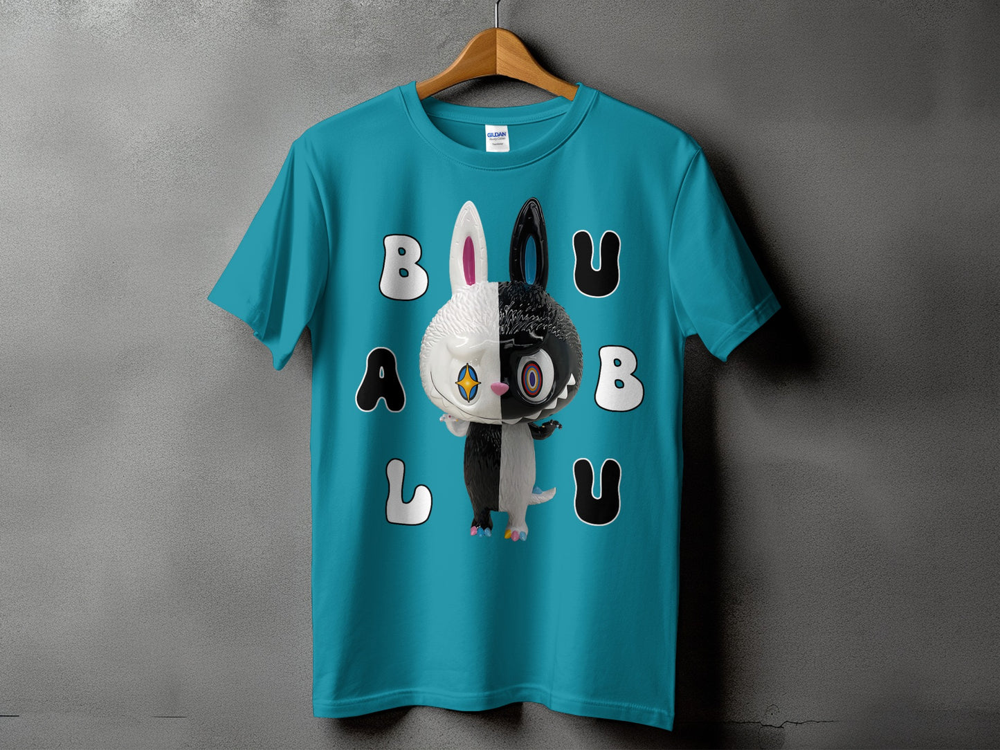 Turquoise t-shirt with a black and white half-and-half bunny figure and text.