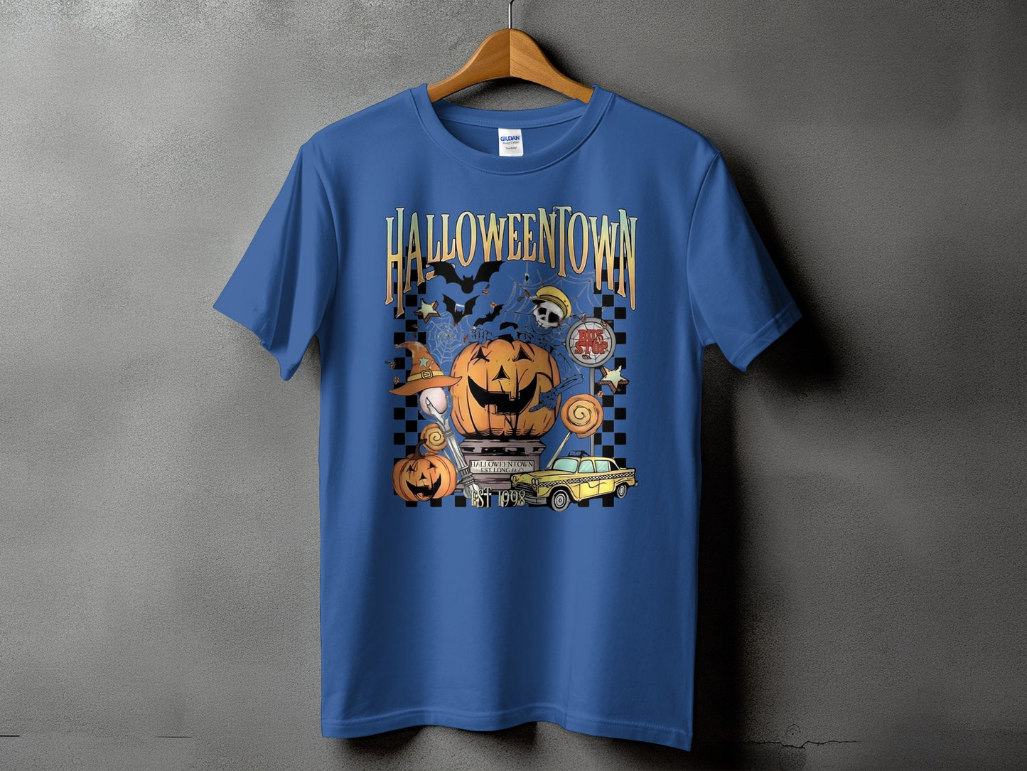 Blue t-shirt with "Halloweentown Est. 1998" graphic featuring pumpkins, bats, and a taxi.