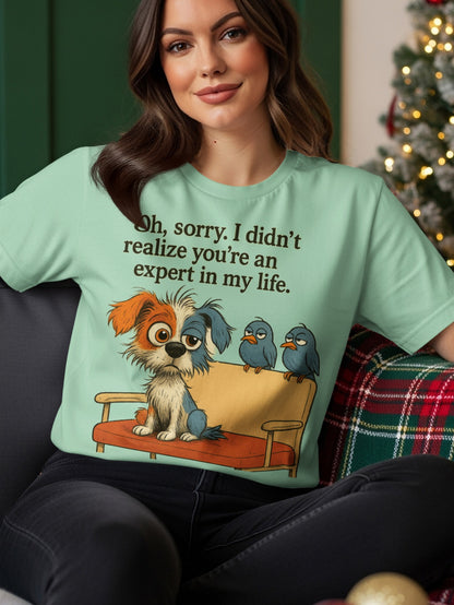 Dog and birds on a couch with text "Oh, sorry. I didn't realize you're an expert in my life."