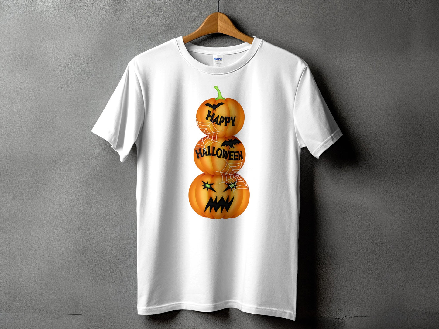 White t-shirt with stacked pumpkins featuring "Happy Halloween" text and bats.