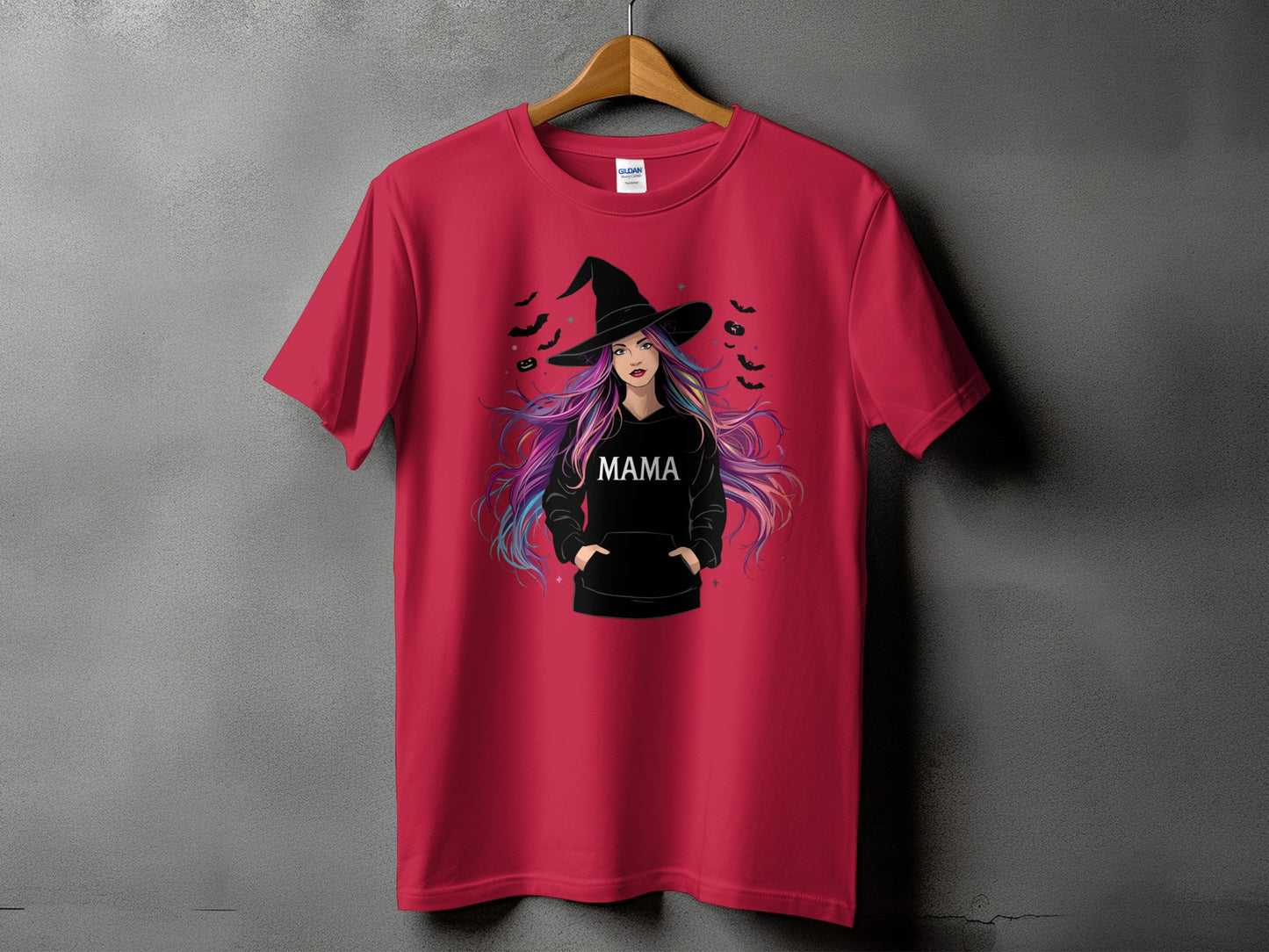 Red t-shirt with witch graphic and "MAMA" text, surrounded by bats and pumpkins.