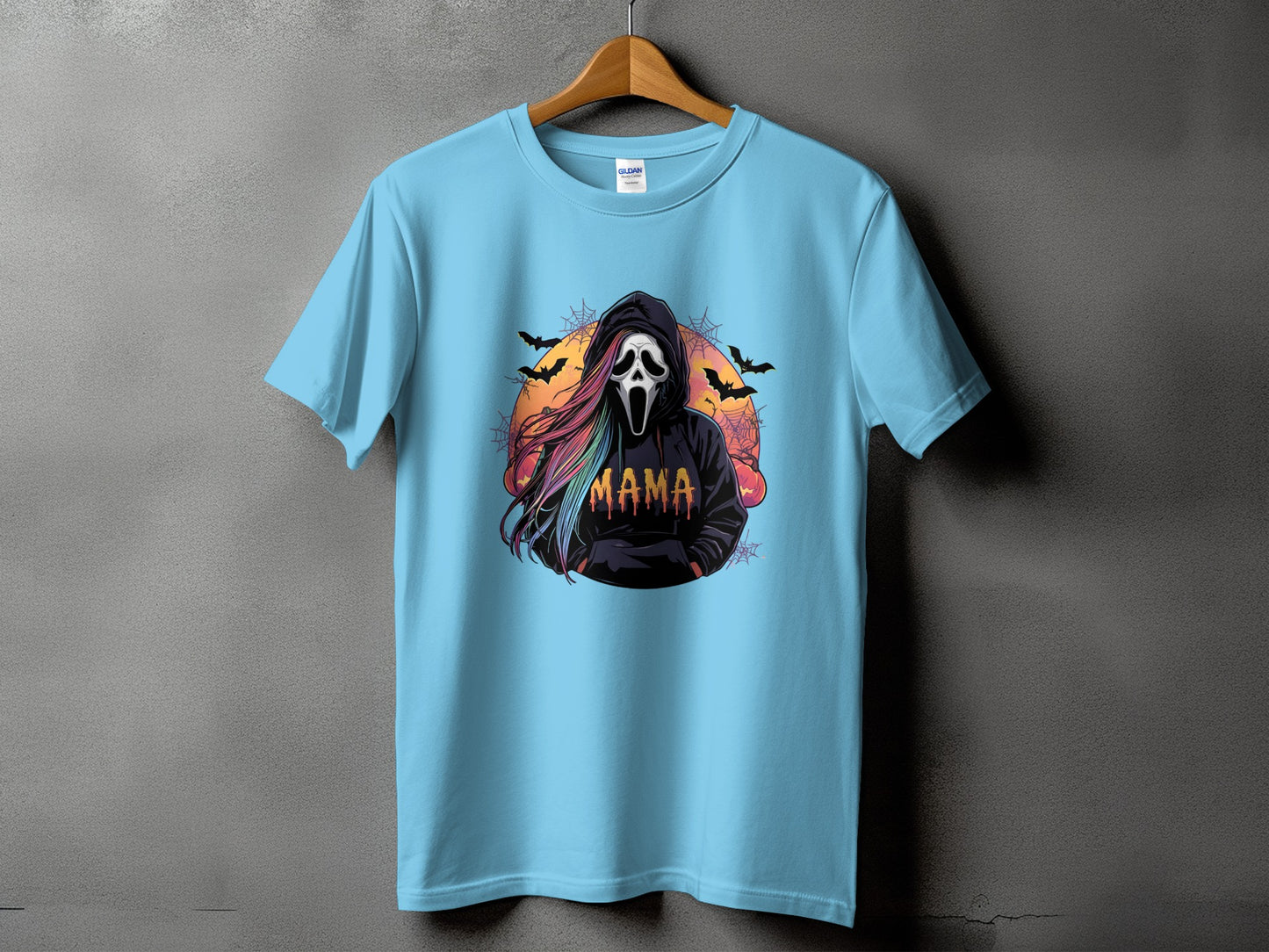 Light blue t-shirt with a Scream mask character and "MAMA" text.