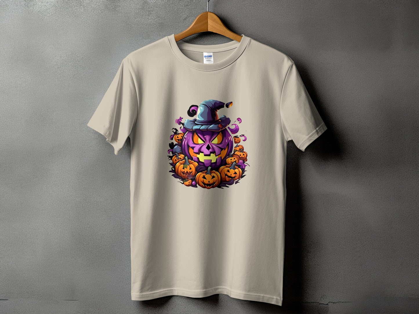 T-shirt with a cartoon purple jack-o'-lantern wearing a witch hat, surrounded by smaller pumpkins.