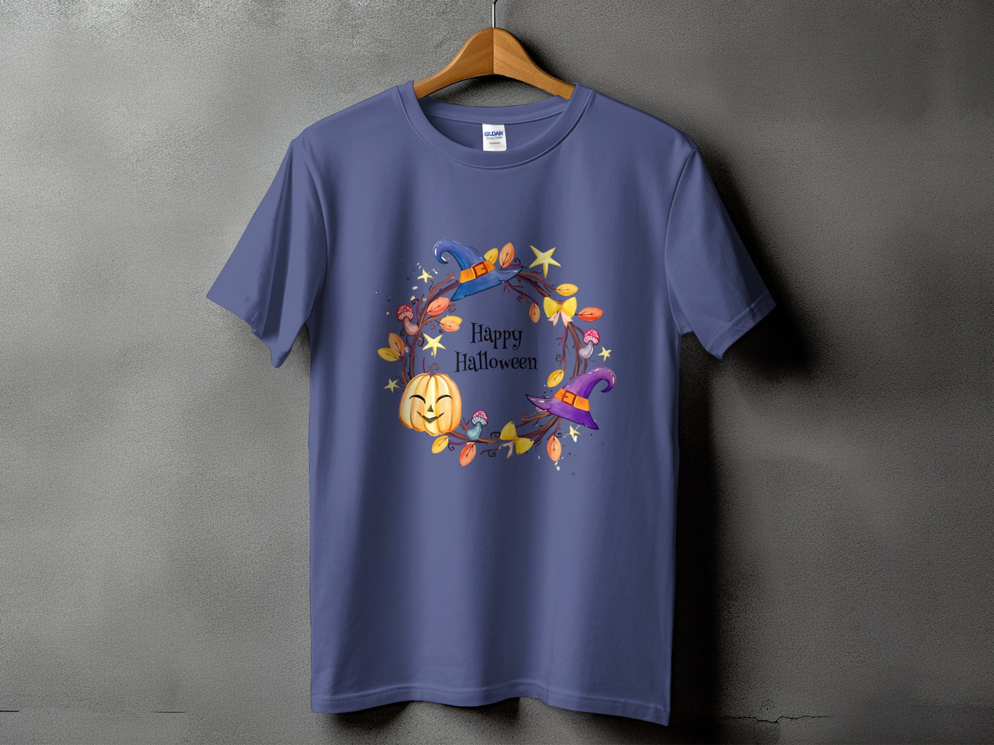 Purple t-shirt with a Halloween wreath design featuring a pumpkin and witch hat.