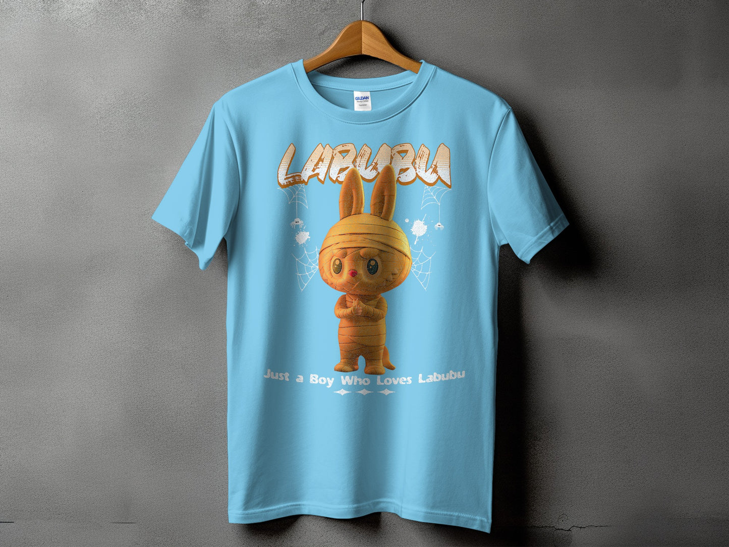 Light blue t-shirt with "LABUBU" text and mummy bunny graphic.
