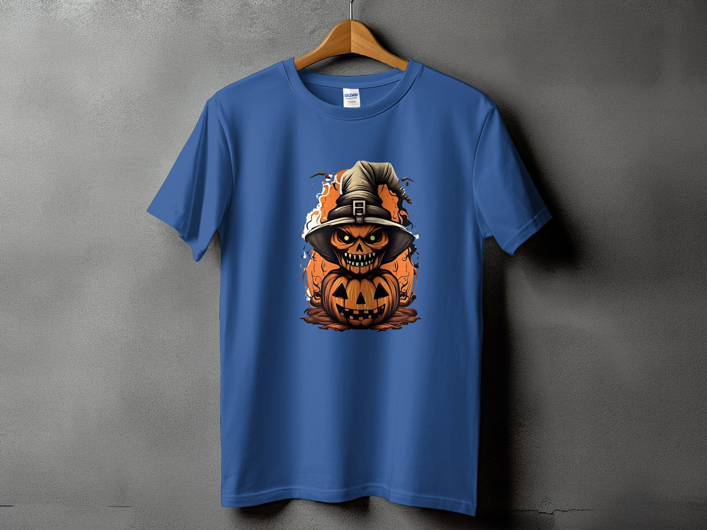 Blue t-shirt with a stacked jack-o'-lantern and witch hat graphic.