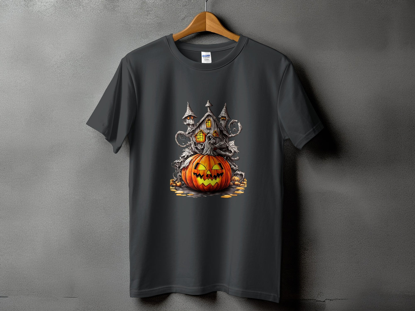 Dark grey t-shirt with a Halloween haunted house and jack-o'-lantern graphic.