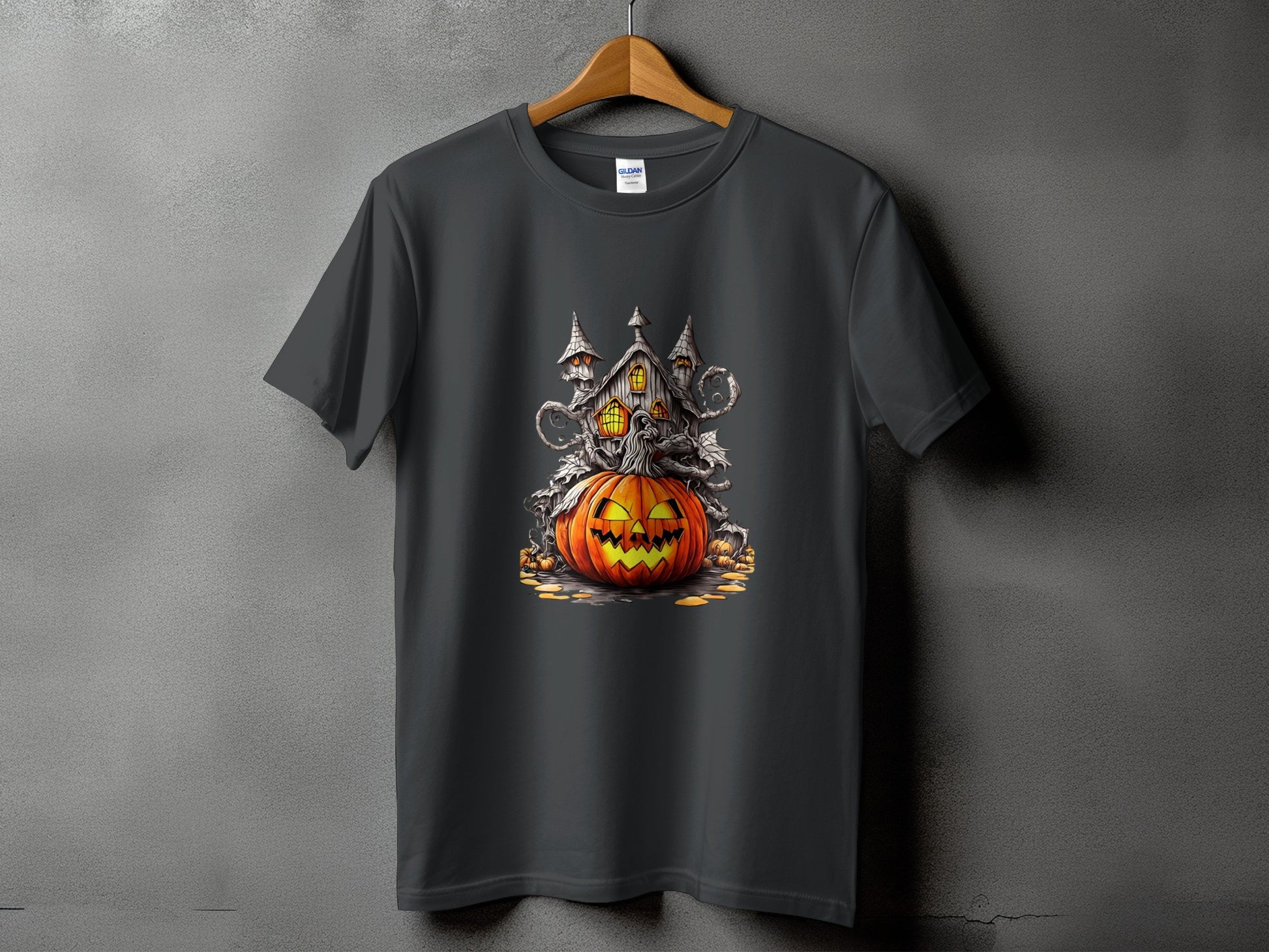 Dark grey t-shirt with a Halloween haunted house and jack-o'-lantern graphic.