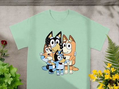 Bluey and family cartoon characters on a mint green t-shirt.