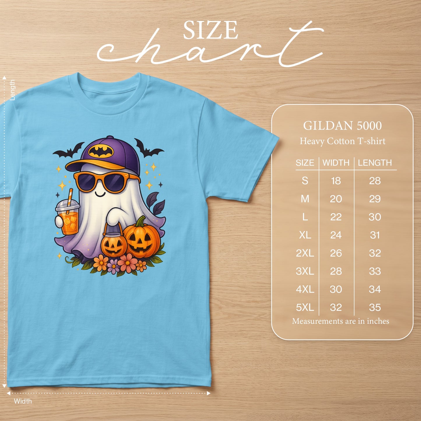Light blue t-shirt with a cartoon ghost wearing sunglasses and a Batman hat. Size chart included.