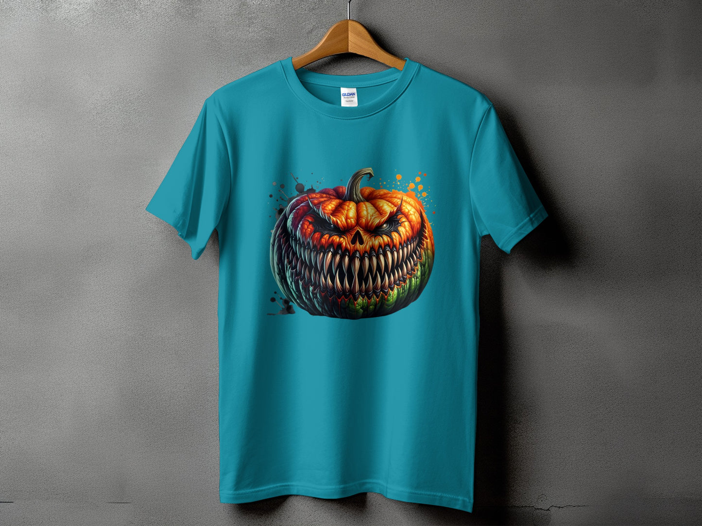 Teal t-shirt with a digitally painted, menacing jack-o'-lantern graphic.