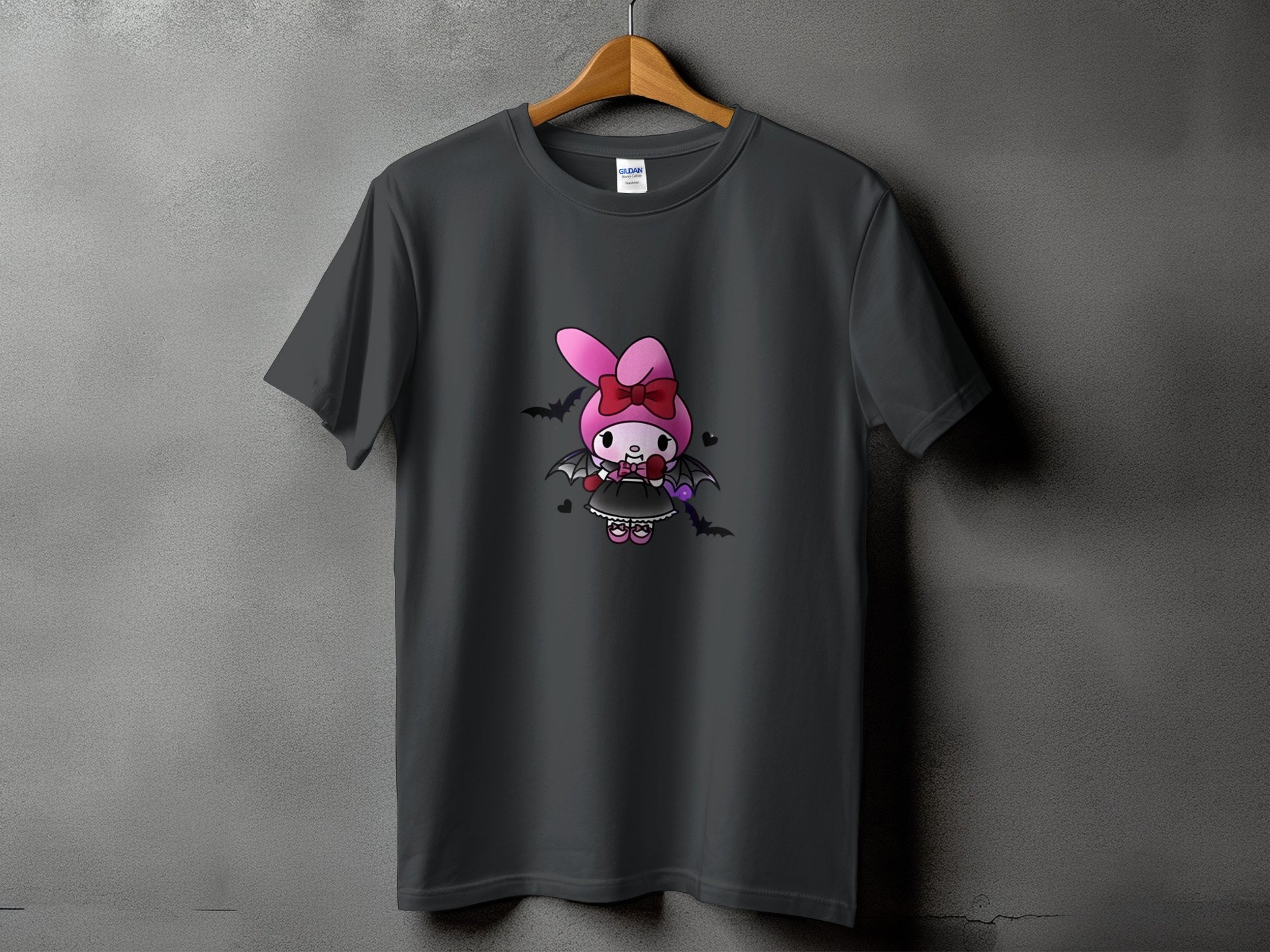 Dark grey t-shirt with cartoon bunny in a black dress and bat wings.
