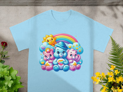 Three Care Bears characters with a rainbow and sun design on a light blue t-shirt.