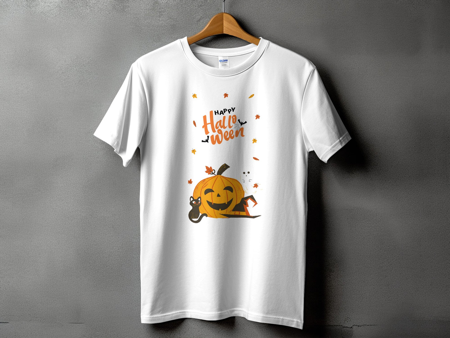 White t-shirt with a Halloween design featuring a pumpkin, cat, and ghost.