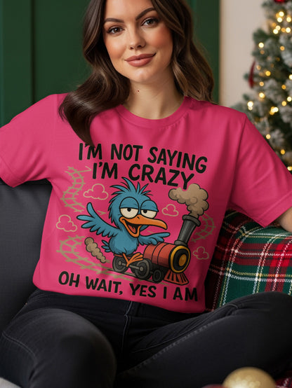 Pink t-shirt with cartoon blue bird on train and text "I'm not saying I'm crazy, oh wait, yes I am."
