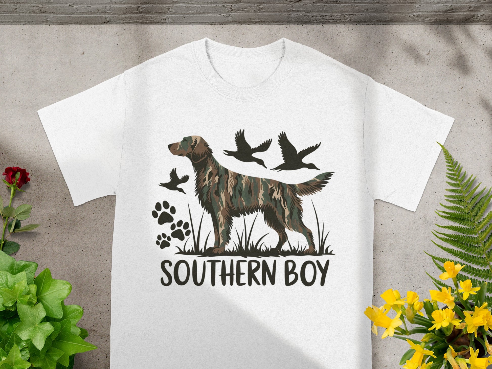 White t-shirt graphic: camouflage dog, flying ducks, paw prints, and text "SOUTHERN BOY".