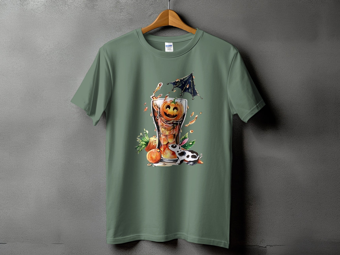 Green t-shirt with a Halloween drink design featuring a pumpkin in a glass and a spotted rabbit.