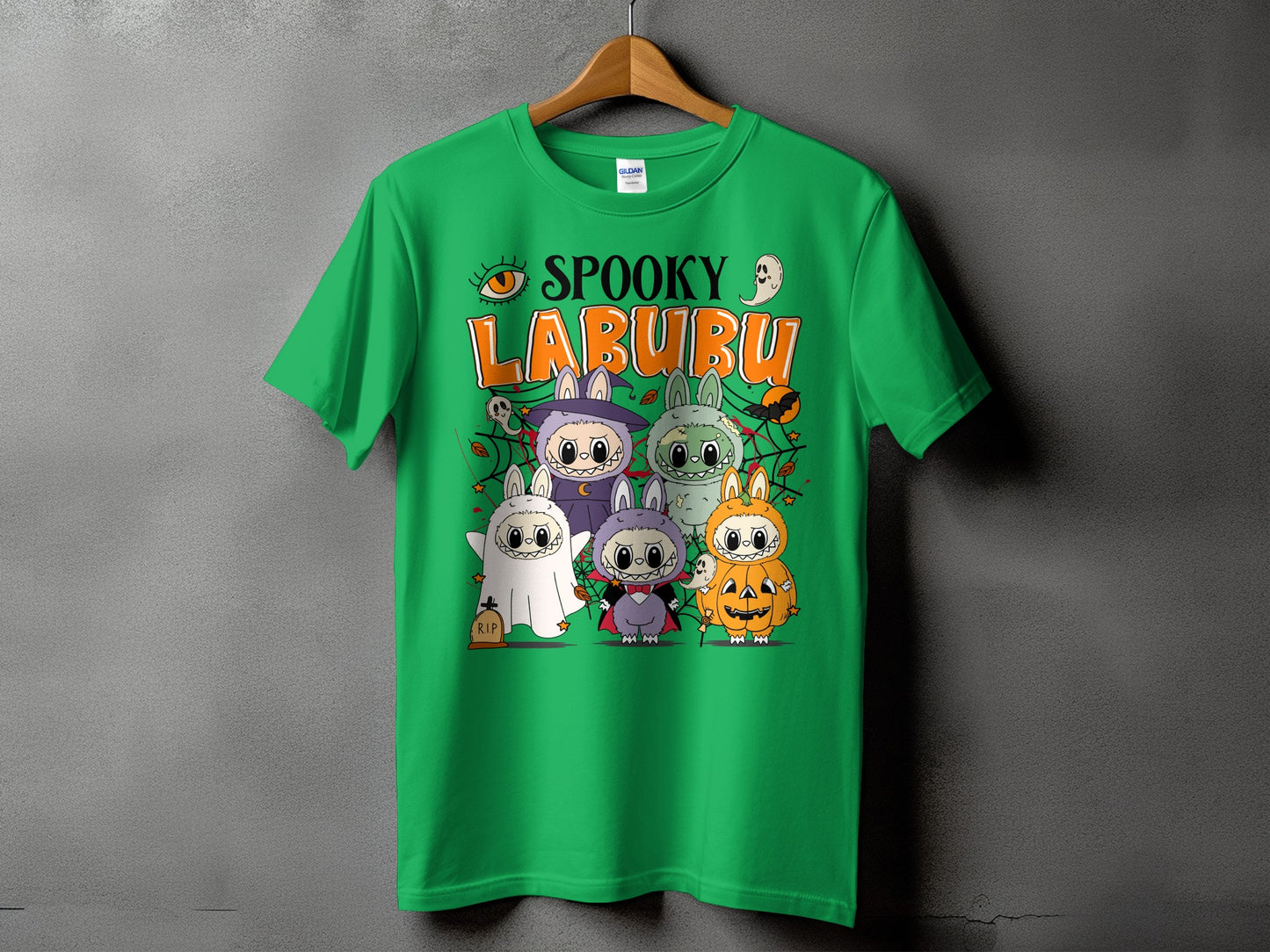 Green t-shirt with "Spooky Labubu" Halloween design featuring cute characters.