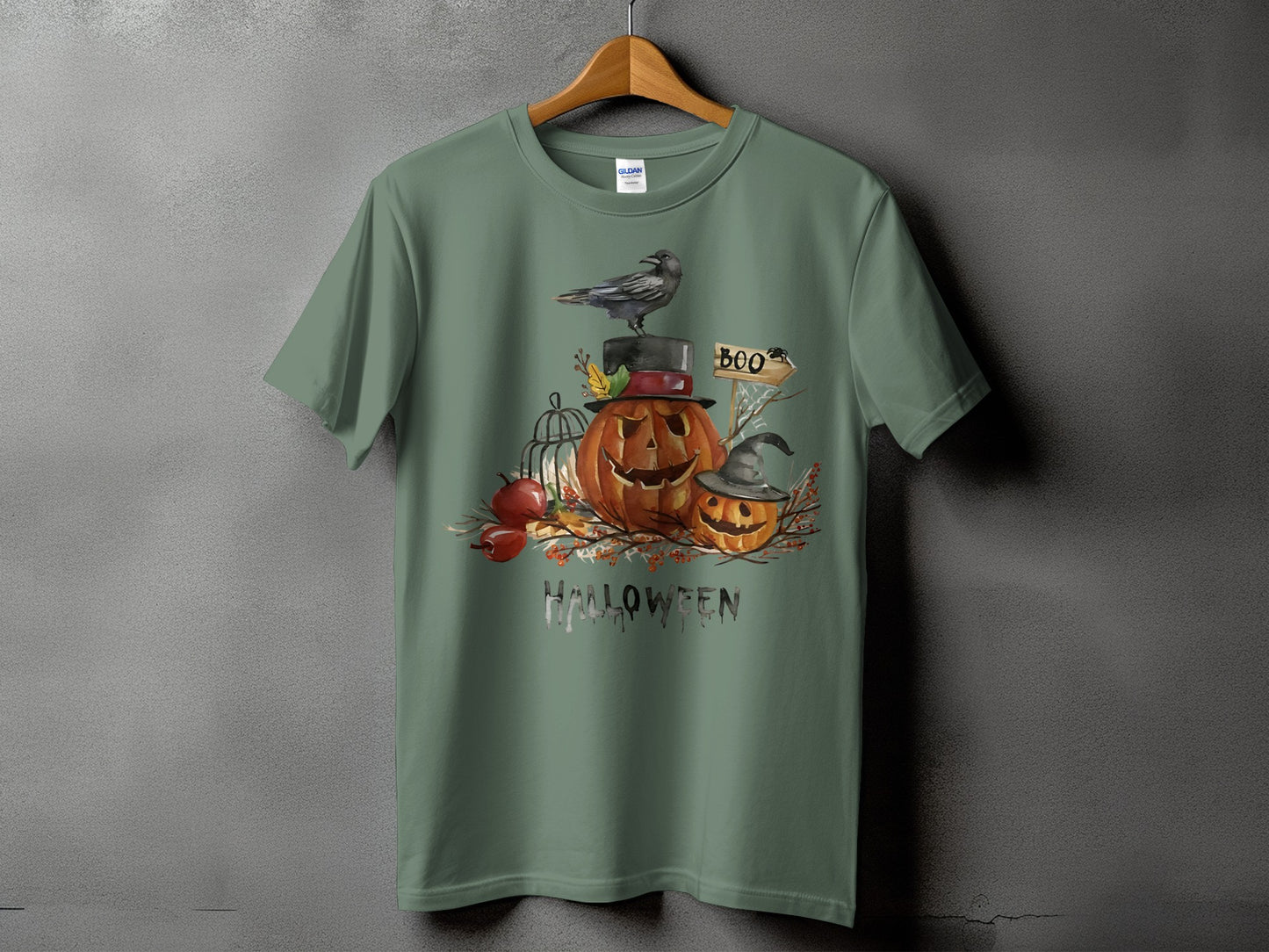 Green t-shirt with Halloween pumpkins, crow, and "Boo" sign graphic.