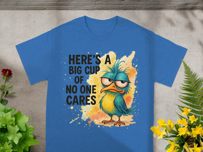 Blue t-shirt with cartoon bird saying "Here's a big cup of no one cares".