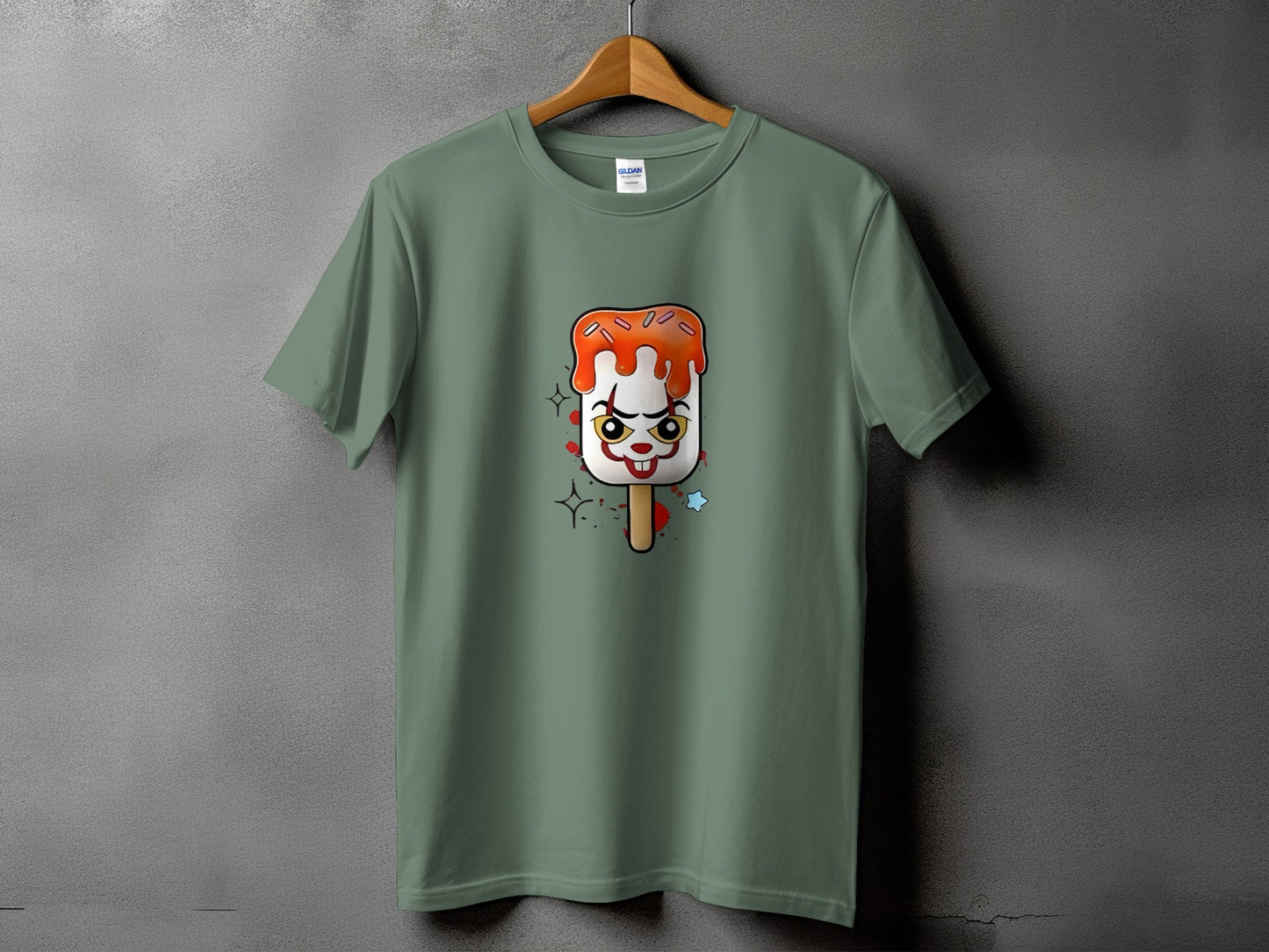 Green t-shirt with a creepy clown popsicle graphic and Gildan tag.