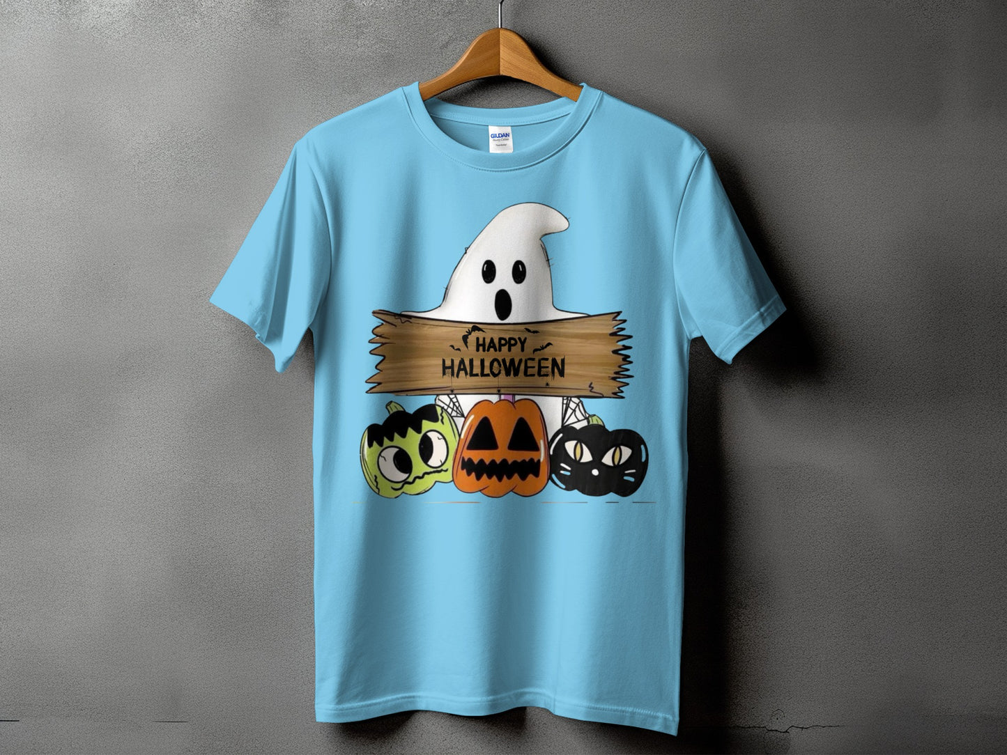 Light blue t-shirt with a ghost and pumpkins graphic saying "Happy Halloween".