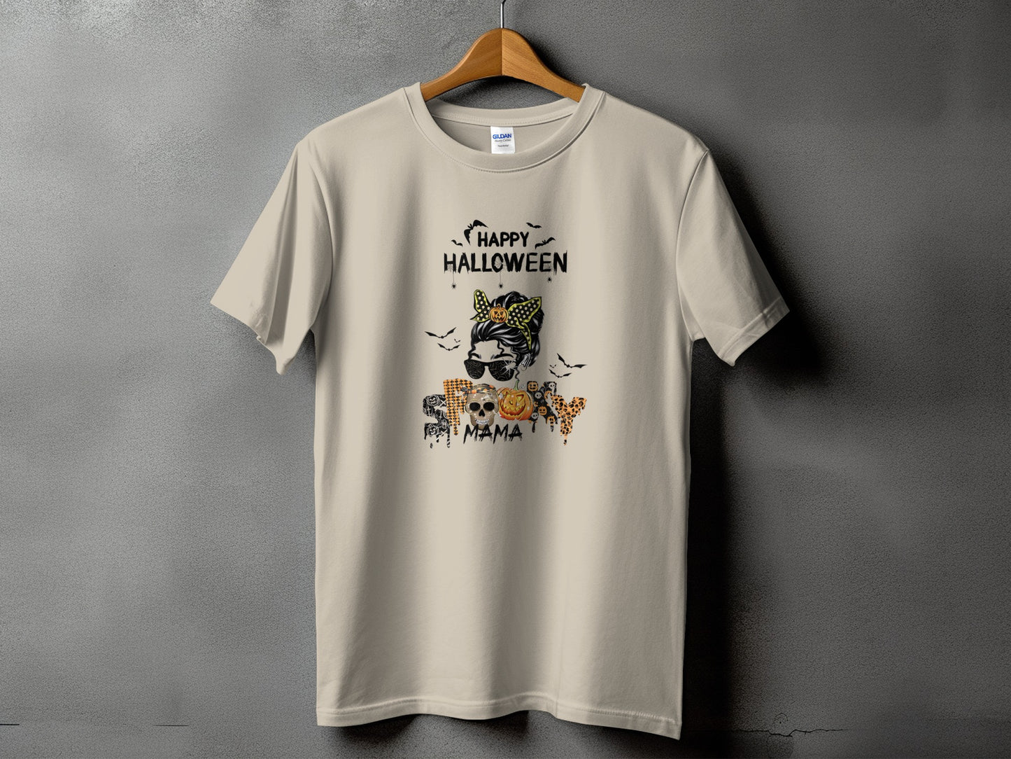 Light-colored t-shirt with "Happy Halloween" and skull, pumpkin, and leopard print design.
