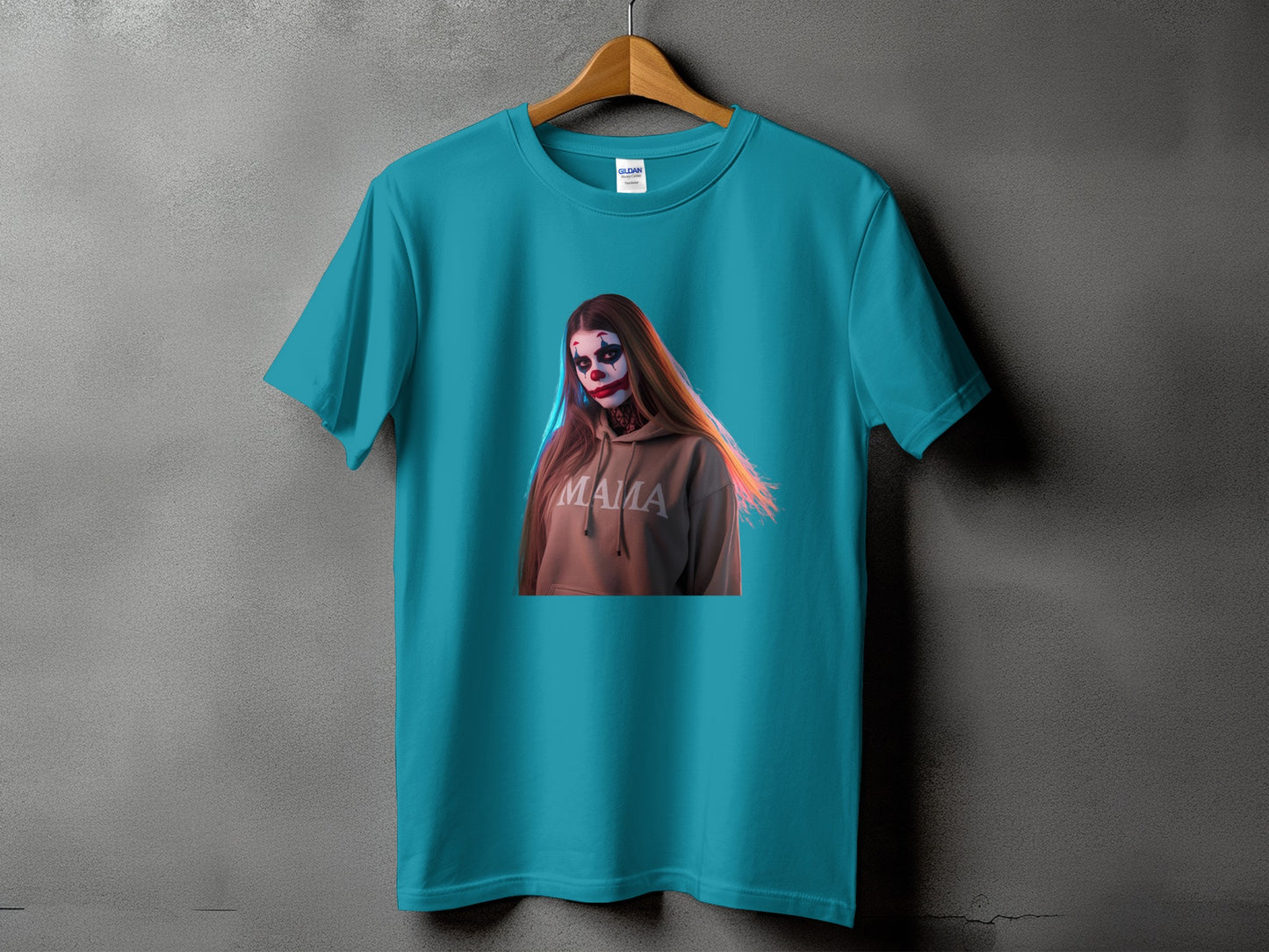 Teal t-shirt with graphic of person in clown makeup and "MAMA" hoodie.