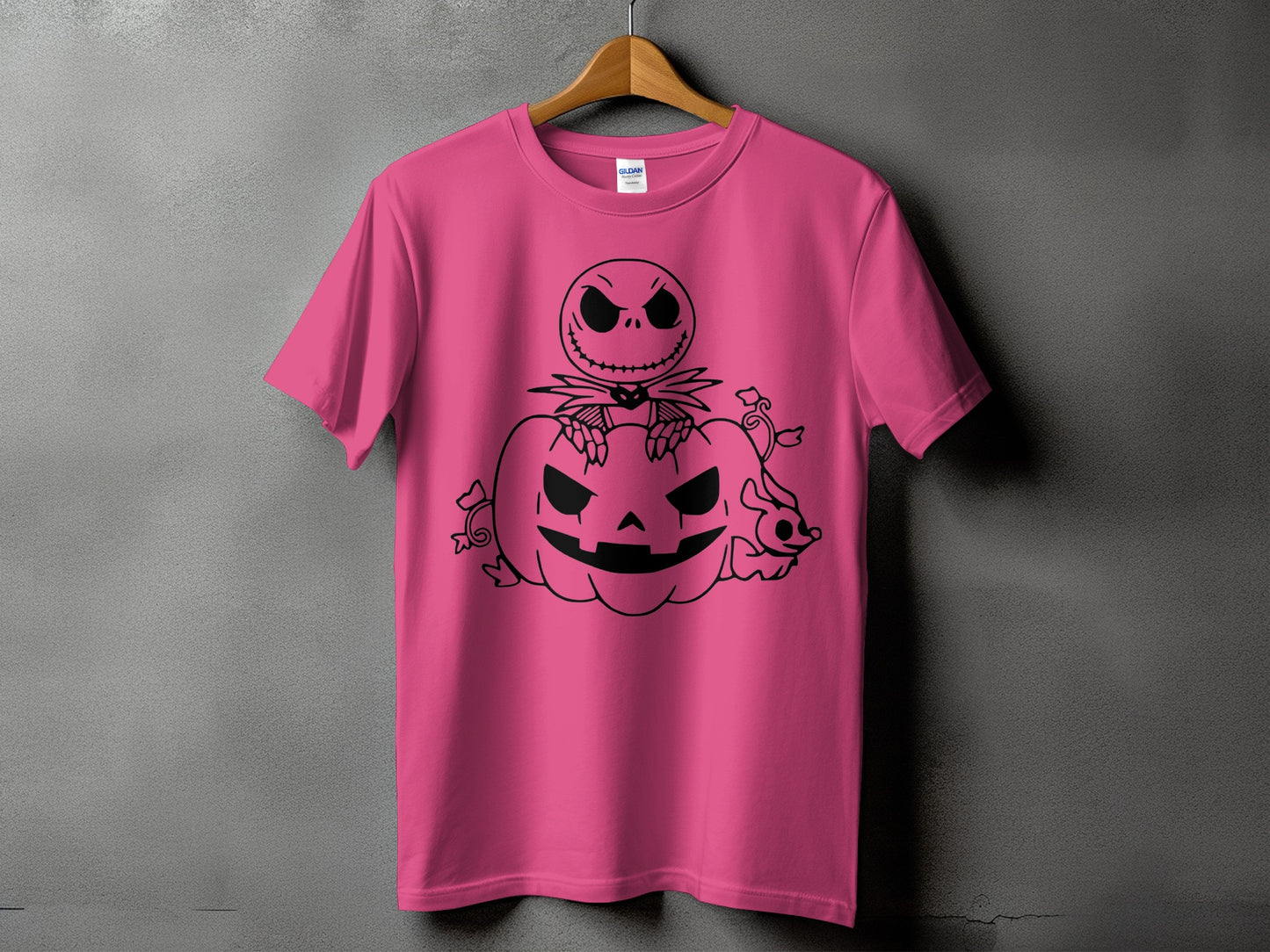 Pink t-shirt with black Jack Skellington and Zero sitting on a pumpkin graphic.