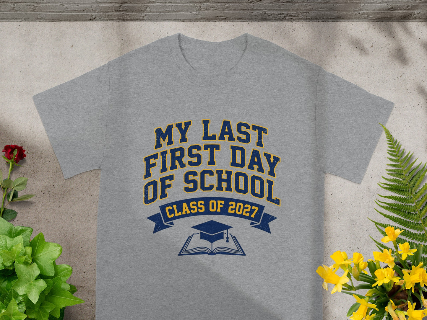 Grey t-shirt with "My Last First Day Of School Class of 2027" and graduation graphics.