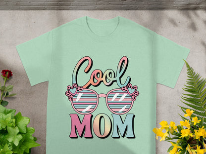 Light green t-shirt with "Cool Mom" text and sunglasses design.