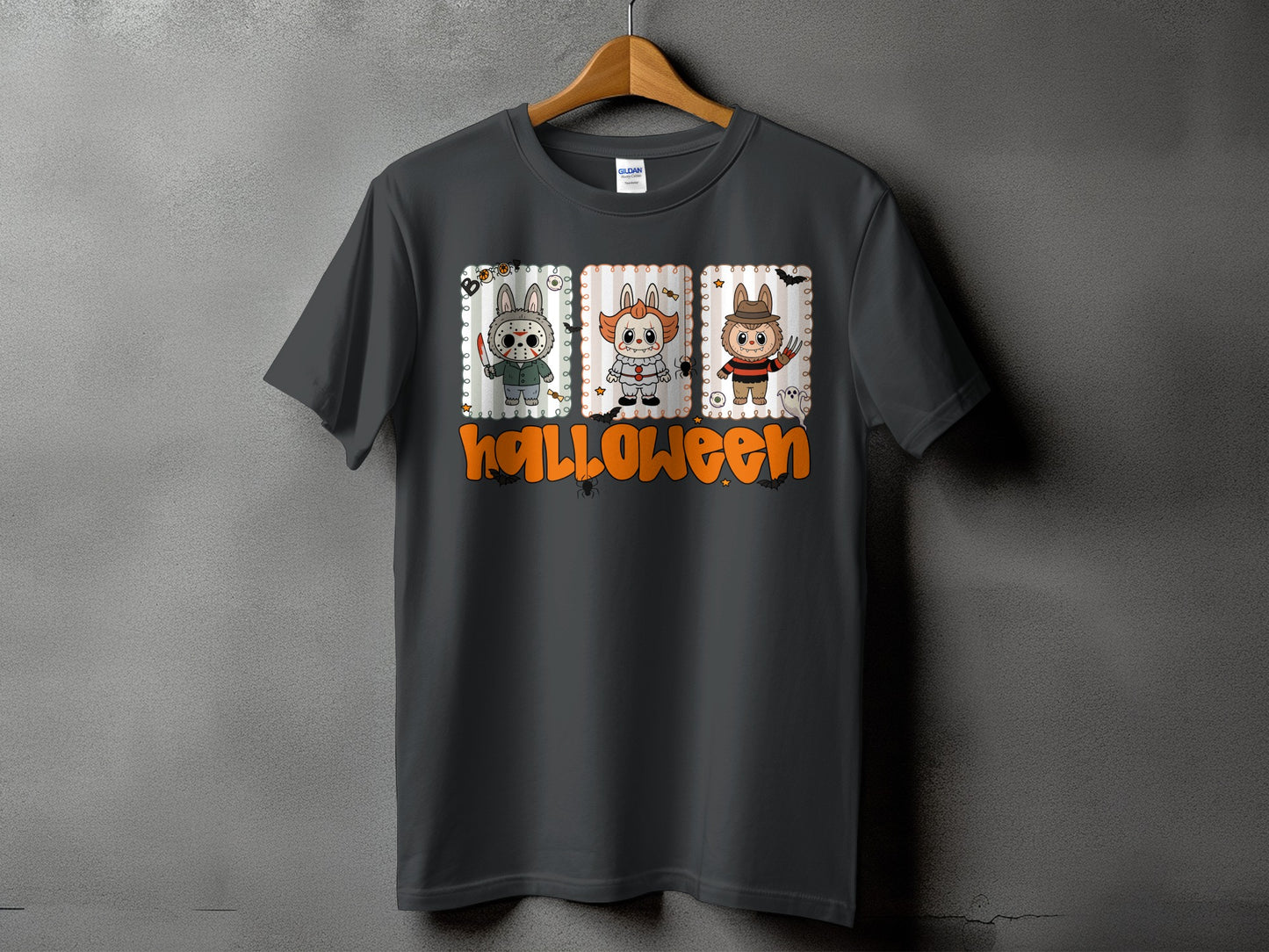 Dark grey t-shirt with cartoon Halloween characters and the word "Halloween".