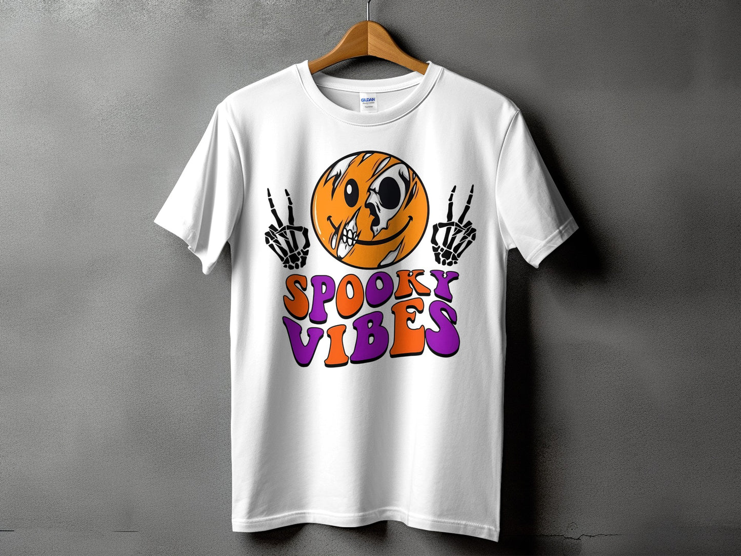 White t-shirt with a cracked smiley face skull and skeleton hands.