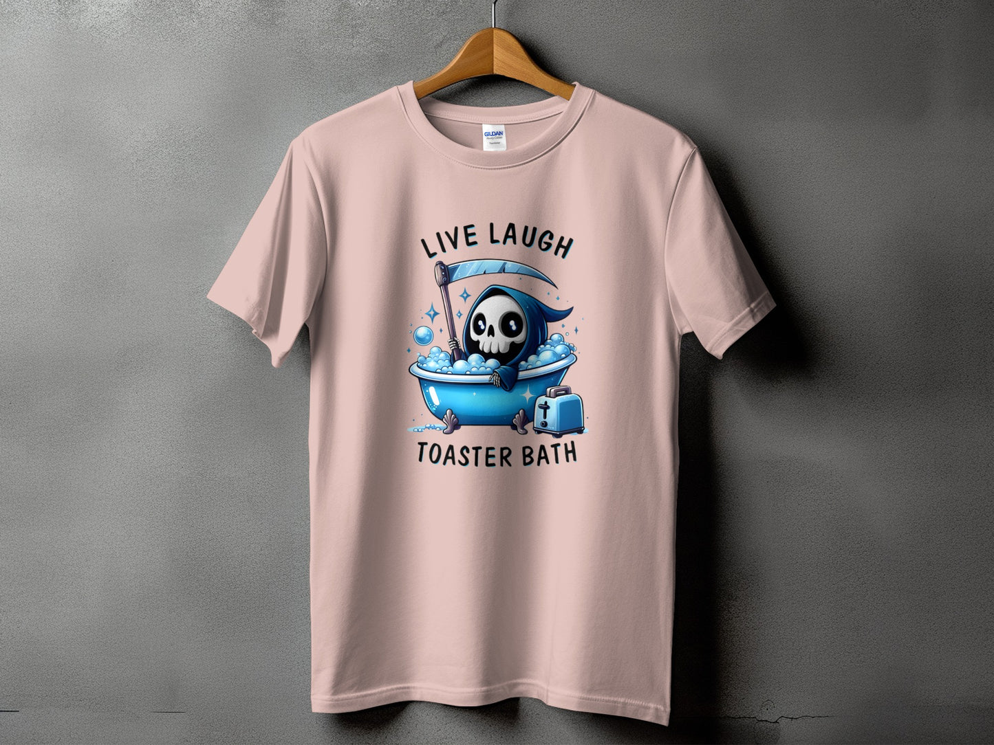 Pink t-shirt with grim reaper in bathtub graphic and text "LIVE LAUGH TOASTER BATH".