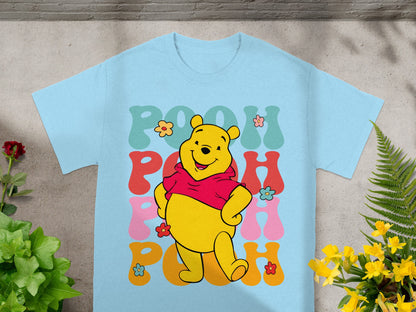 Light blue t-shirt with Winnie the Pooh graphic and "Pooh" text.