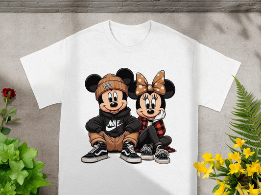 Mickey and Minnie Mouse sit together wearing streetwear and sneakers.