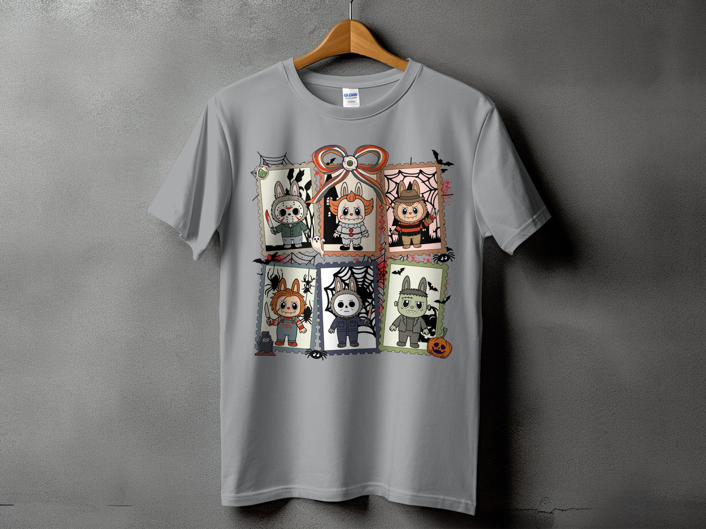Gray t-shirt with Halloween-themed characters printed in six postage stamp-like frames.