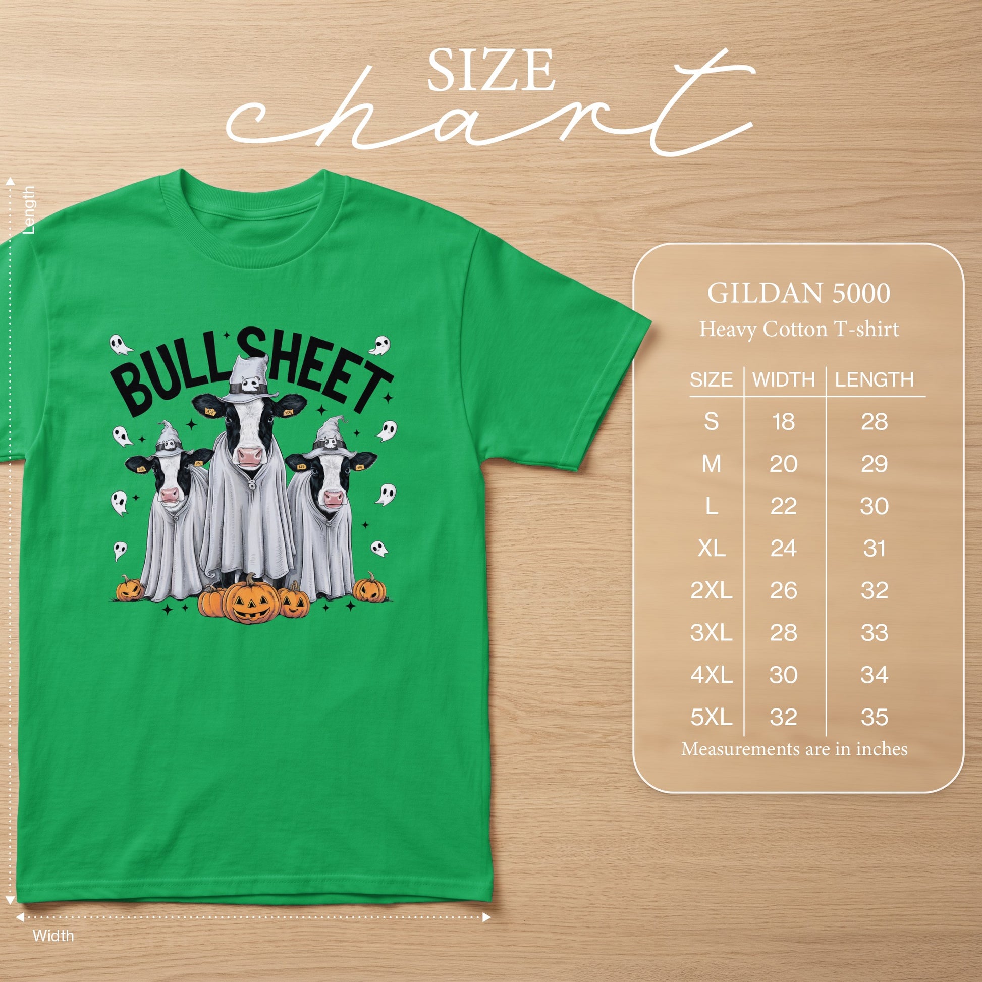 Green t-shirt with three cows dressed as ghosts and pumpkins. Size chart provided.
