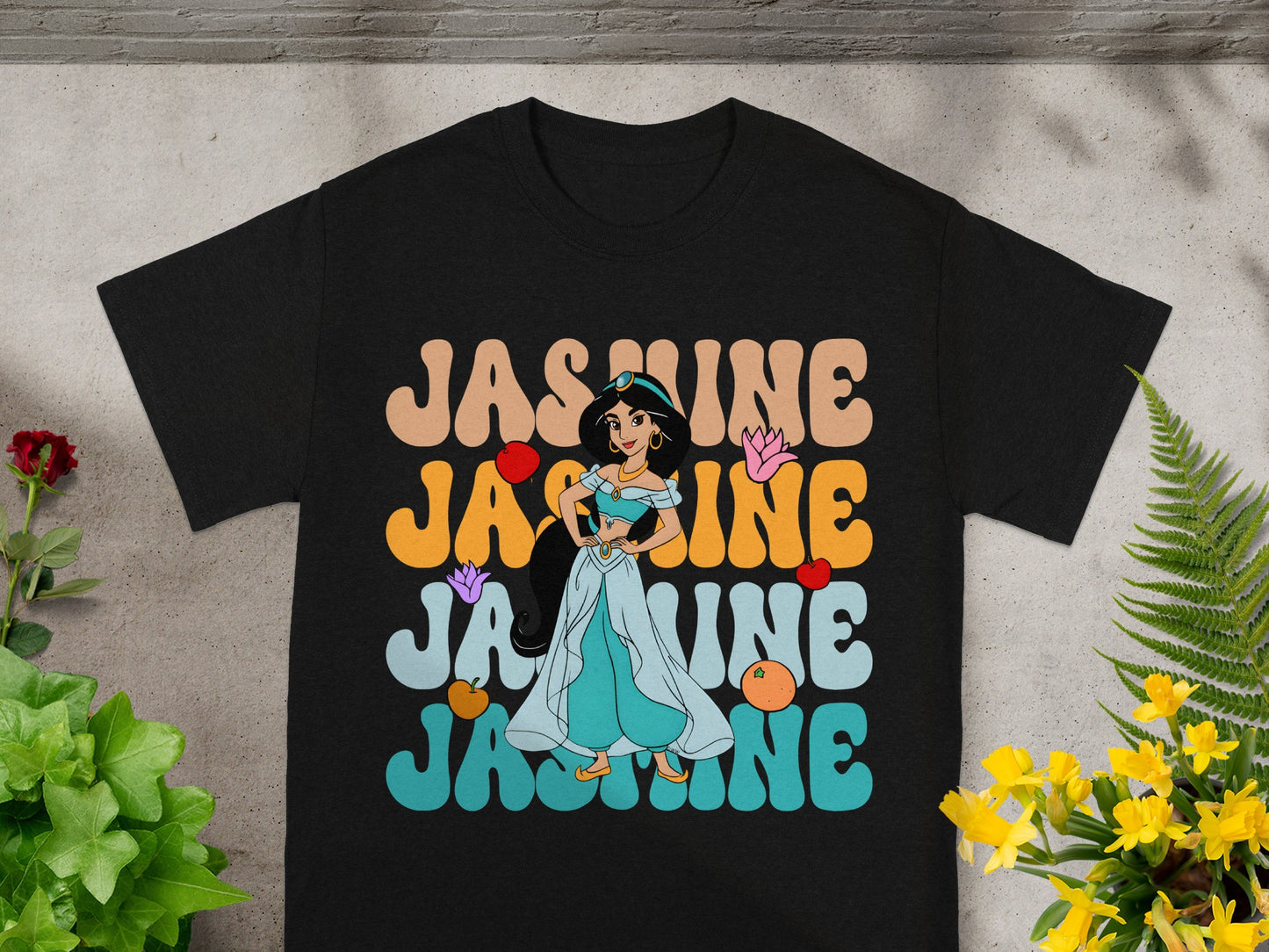 Black t-shirt with Princess Jasmine graphic and text.