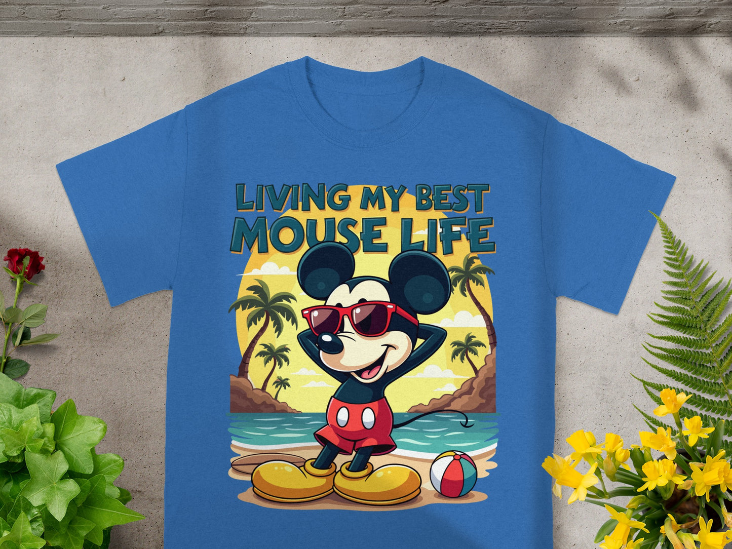 Mickey Mouse in sunglasses on a beach with "Living My Best Mouse Life" text.