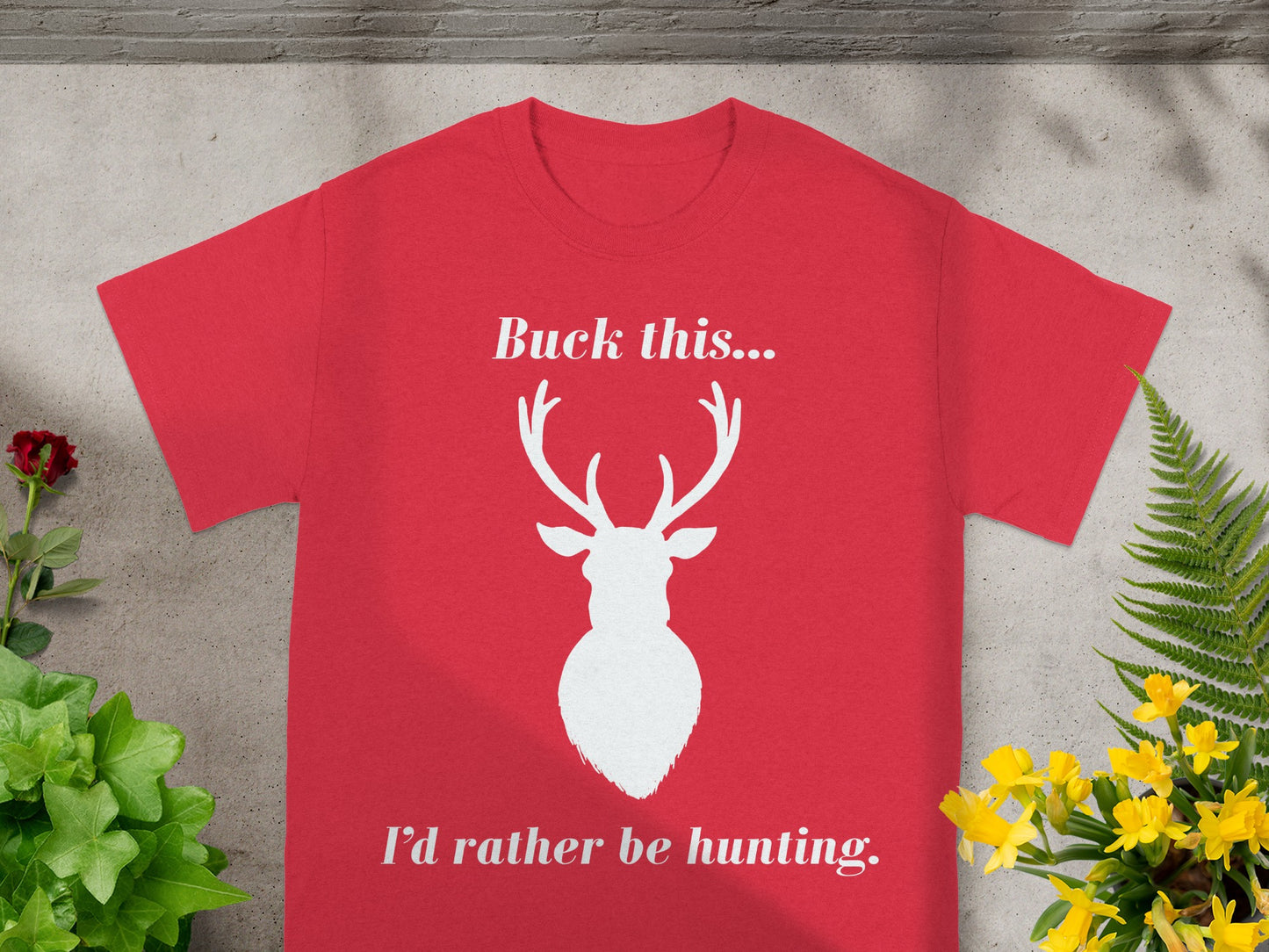 Red t-shirt with white text "Buck this... I'd rather be hunting" and deer silhouette.