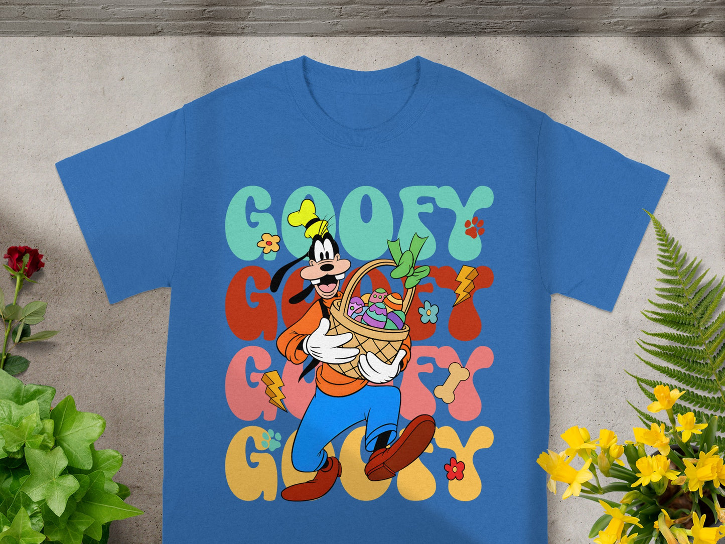 Goofy in blue pants carrying a basket of Easter eggs and flowers.