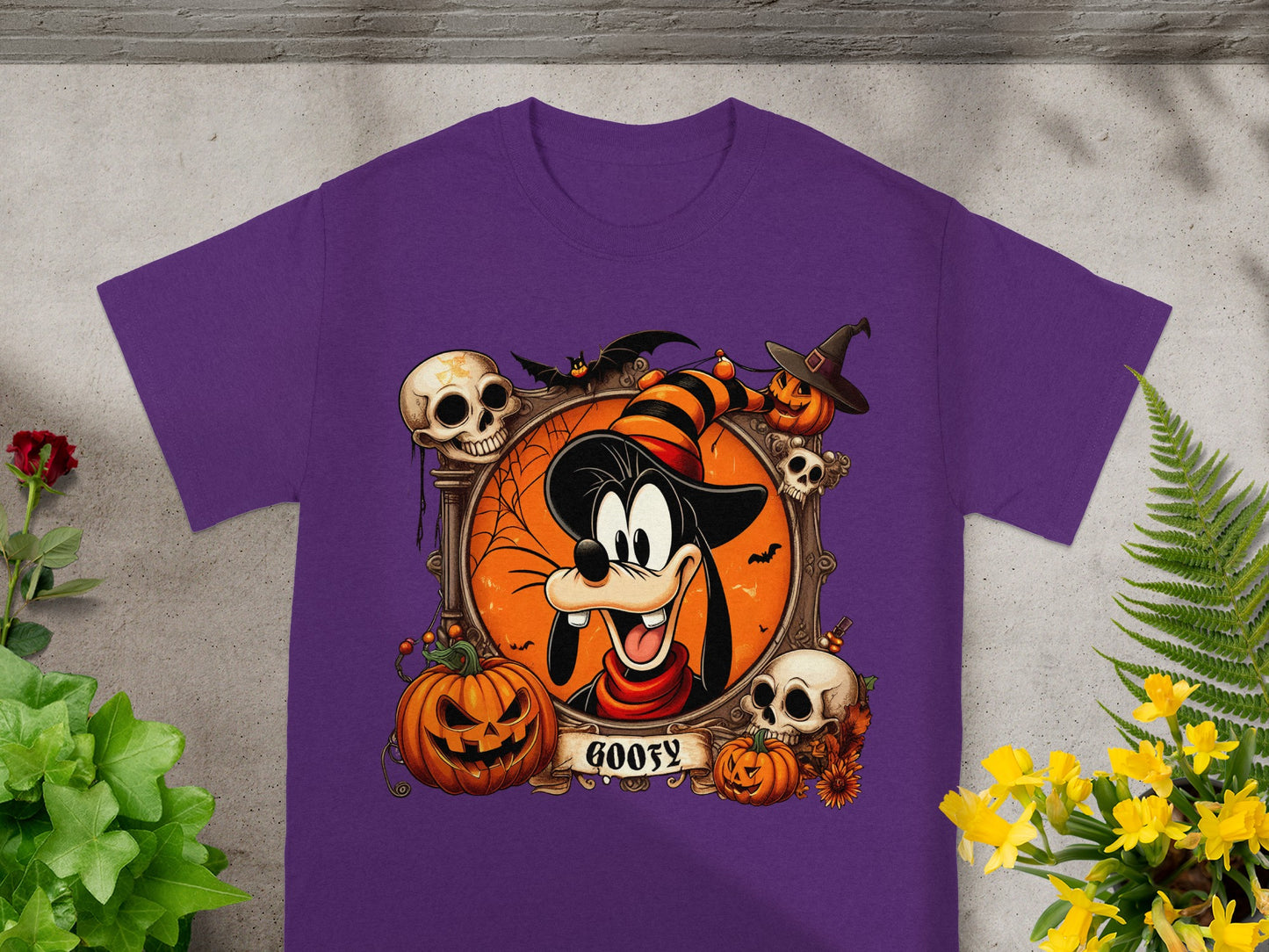 Goofy in a Halloween frame with pumpkins, skulls, bats, and the word "Goofy".