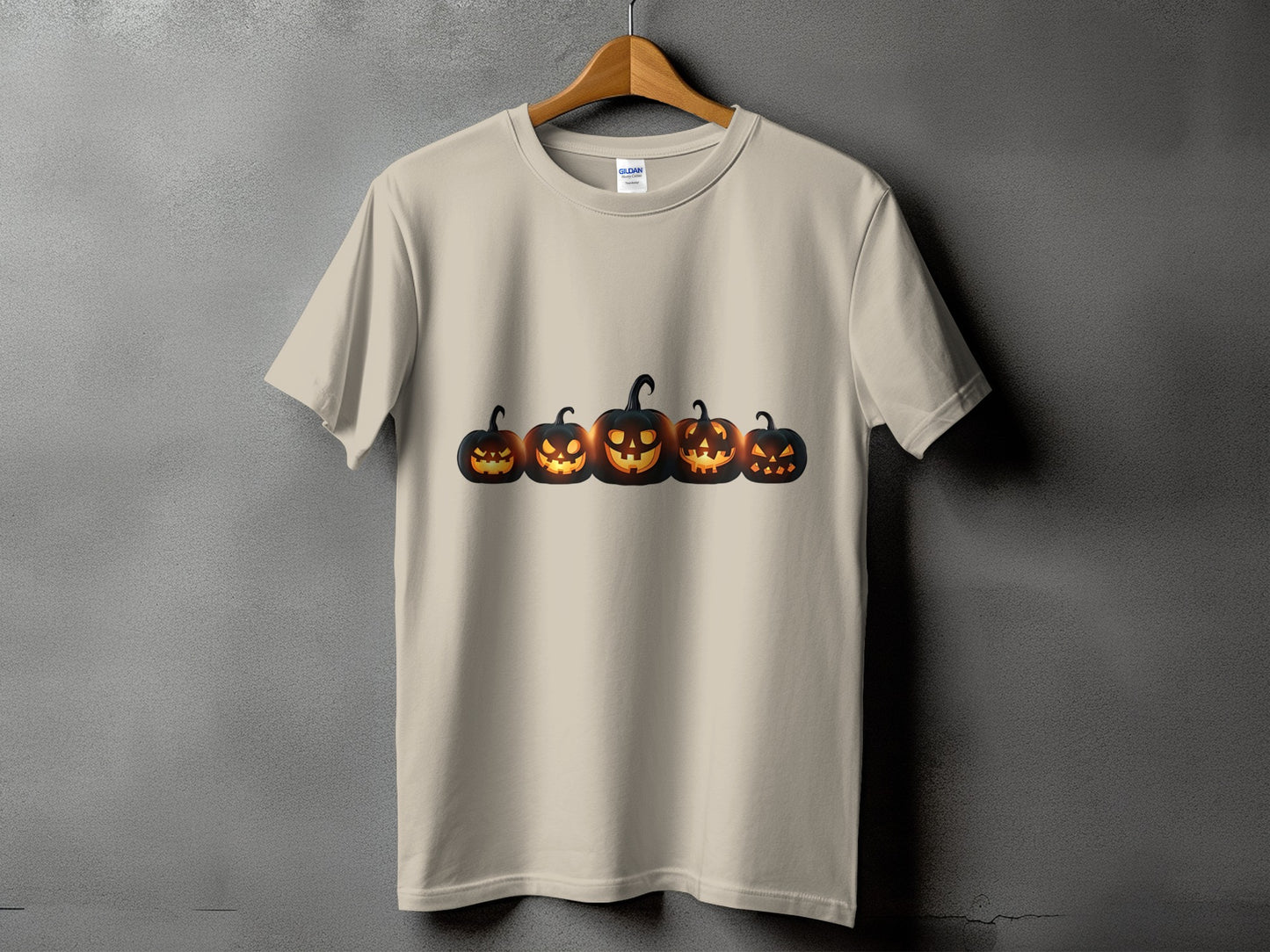 T-shirt with a line of five glowing Jack-o'-lanterns across the chest.