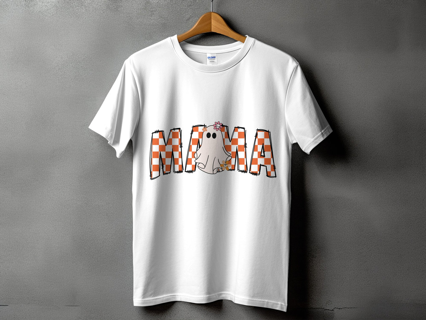 White t-shirt with "MAMA" text featuring a ghost and checkered pattern.