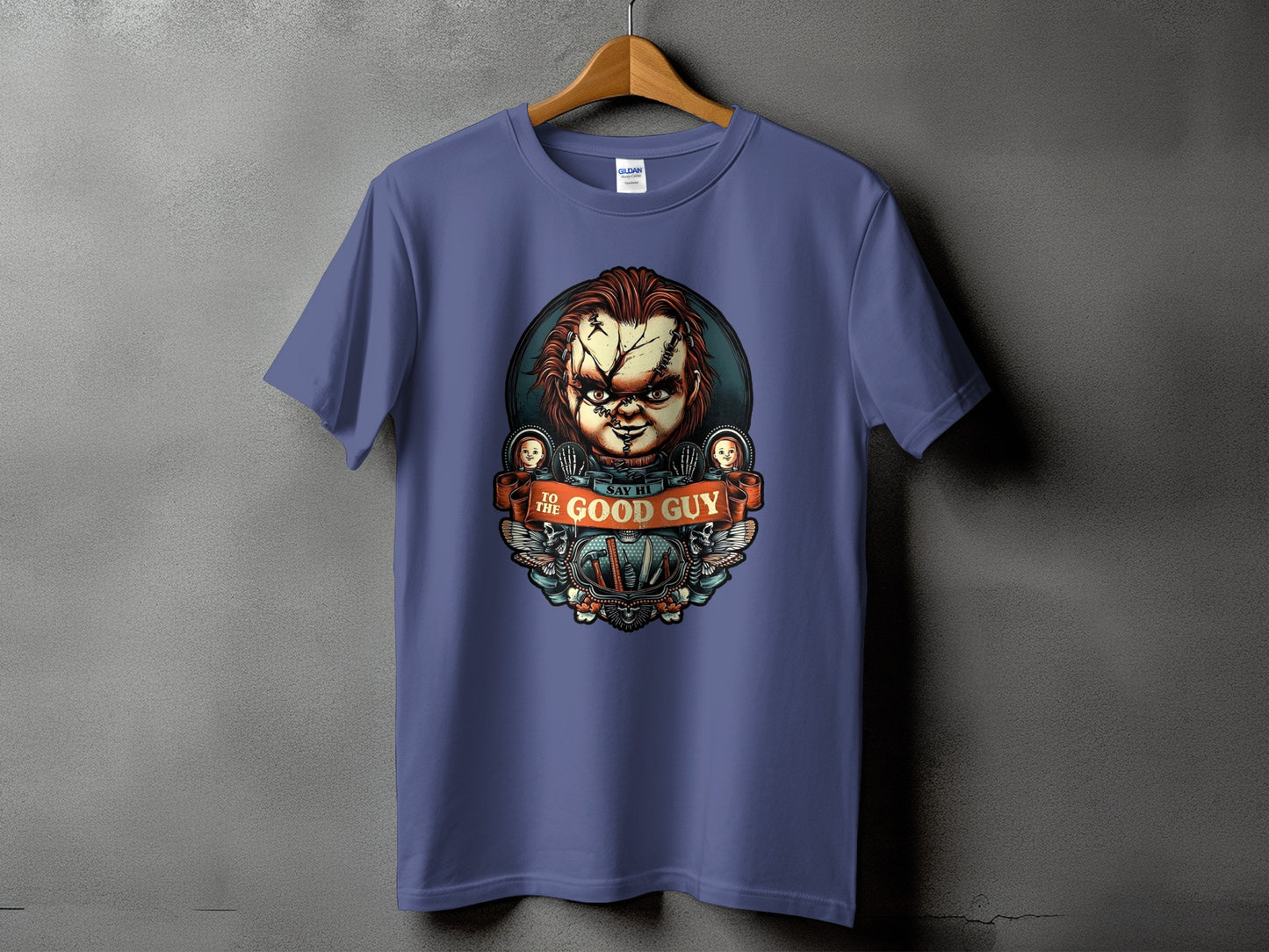 Purple t-shirt with Chucky's face and the text "Say Hi to The Good Guy".