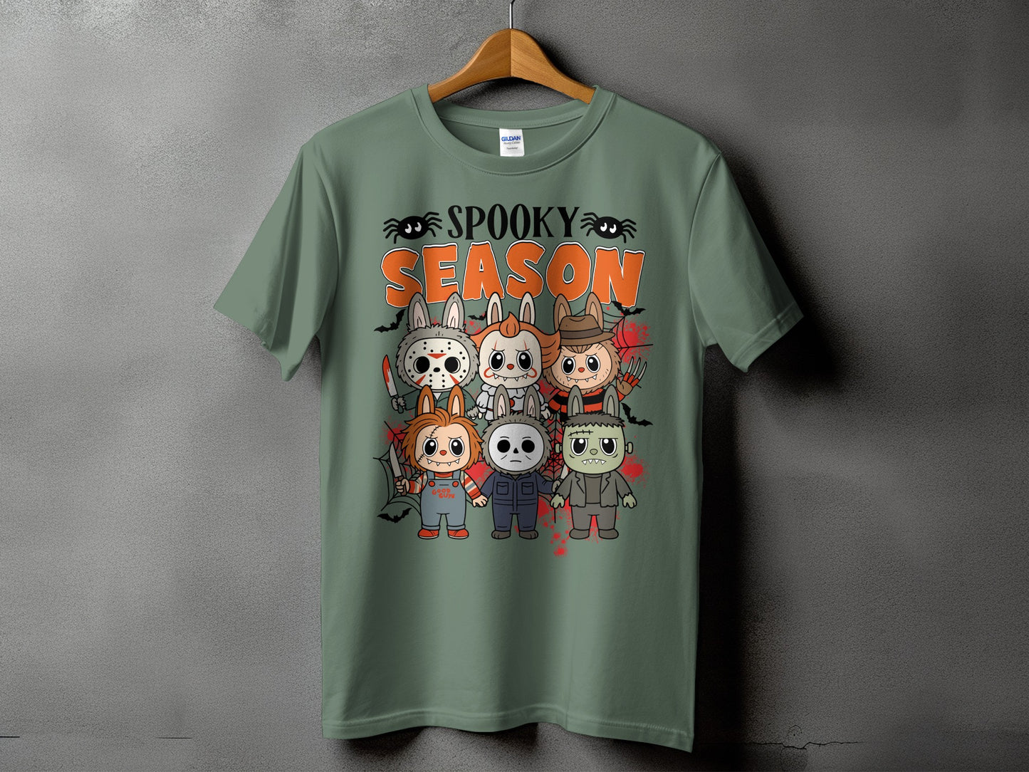 Green t-shirt with "Spooky Season" and cartoon horror characters.