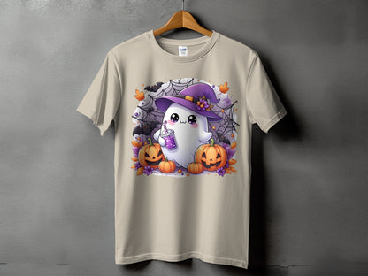 T-shirt with a kawaii ghost in a witch hat, holding a drink, surrounded by pumpkins.