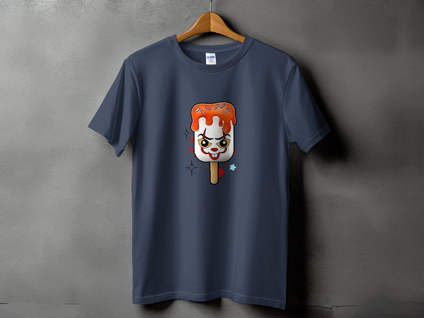 T-shirt with a clown-faced popsicle graphic and scattered stars.